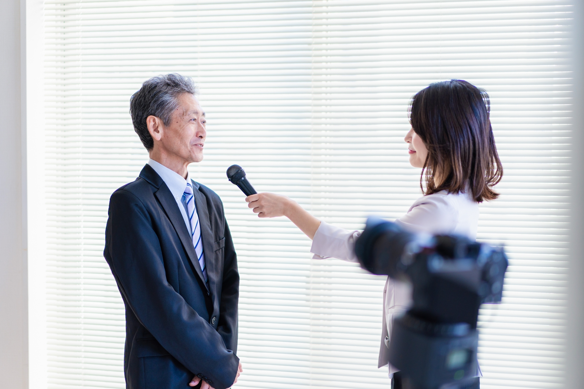 インタビューに答える社長