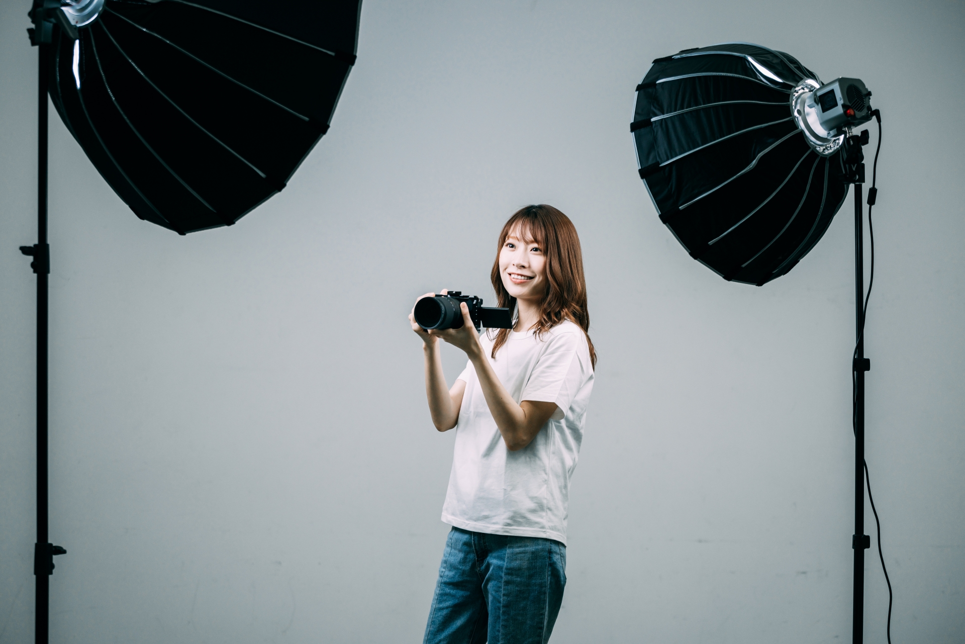 女性カメラマン